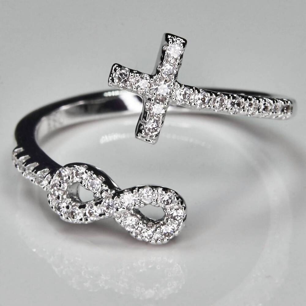 NEW FAIRE infinity cross rhodium plated in silver